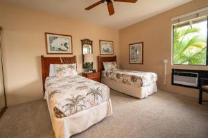 Ένα ή περισσότερα κρεβάτια σε δωμάτιο στο Grand Champions Golf Villas 118 +31 φωτογραφίες