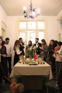 a group of people standing around a table in a room at Konak Bergama in Bergama