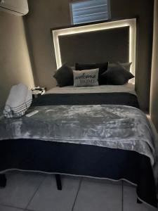 Postel nebo postele na pokoji v ubytování Dreamscape