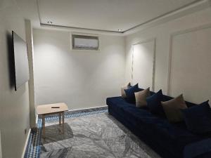 TV a/nebo společenská místnost v ubytování Hotel Cote ocean Mogador