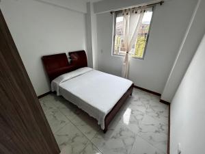 Ένα ή περισσότερα κρεβάτια σε δωμάτιο στο Apartamento Acogedor y Moderno 2