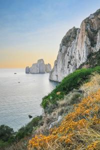 a view of the ocean from a cliff at Villaggio Malfidano in Buggerru