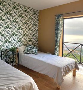 Giường trong phòng chung tại Villa perejil +62 ảnh