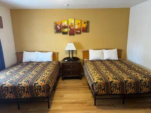 Postel nebo postele na pokoji v ubytování Supai Motel