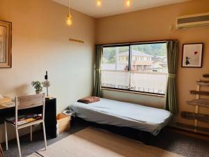 Katil atau katil-katil dalam bilik di 民宿たかはま Takahama Guest house