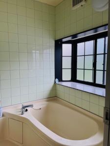 Bilik mandi di 民宿たかはま Takahama Guest house