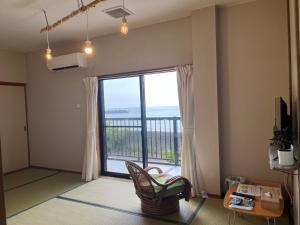 Televisyen dan/atau pusat hiburan di 民宿たかはま Takahama Guest house
