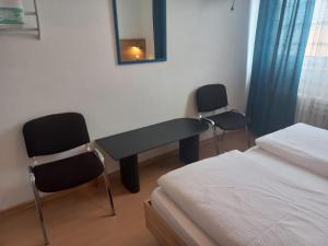 Hotel Weidnerhof客房内的一张或多张床位