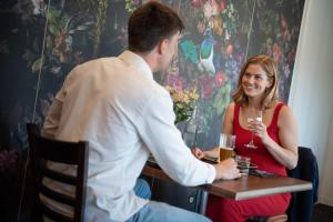 Os clientes hospedados em Tides Hotel