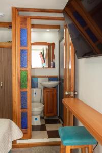 Koupelna v ubytování Habitación La Amelia