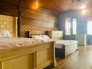 Postel nebo postele na pokoji v ubytování Shim Beach Resort