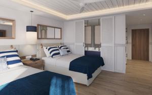 Letto o letti in una camera di Secrets Saint Lucia Resort & Spa - All Inclusive