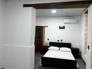 Casa Encanto Buga客房内的一张或多张床位