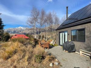 a house with solar panels on the side of it at Number 8 - Castle Hill Village in Castle Hill