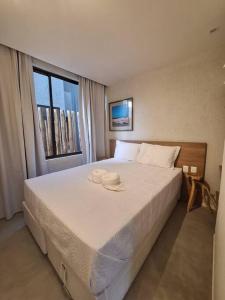 En eller flere senge i et værelse på Casa Piscina Privativa I Capela I Mar 100 metros