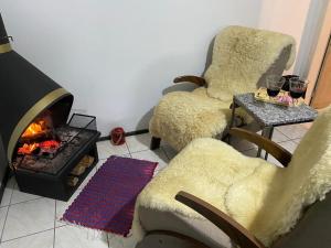 Posezení v ubytování Apt com vista para o mar