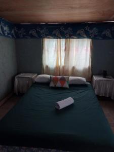 Postel nebo postele na pokoji v ubytování Nasakeci Room