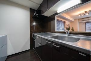 Una cocina o zona de cocina en Fancy2