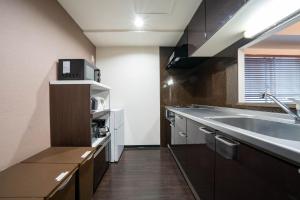 Una cocina o zona de cocina en Fancy2