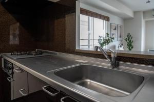 Una cocina o zona de cocina en Fancy2
