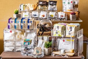 a display of food products on a table at Hotel Quest Shimizu in Shizuoka