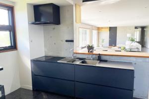 Kuchyň nebo kuchyňský kout v ubytování Beach House Kabira