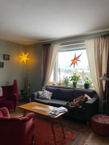 Χώρος καθιστικού στο Cozy, stylish apartment in the heart of the town
