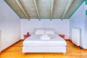 Postel nebo postele na pokoji v ubytování Mavres Luxury Loft