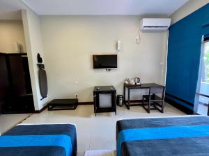 Letto o letti in una camera di Hotel Randiya Anuradhapura