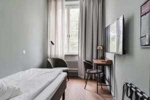 Ένα ή περισσότερα κρεβάτια σε δωμάτιο στο Home Hotel Post