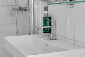 Ένα μπάνιο στο Home Hotel Post