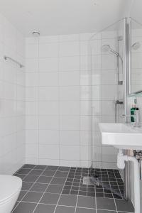 Ένα μπάνιο στο Home Hotel Post