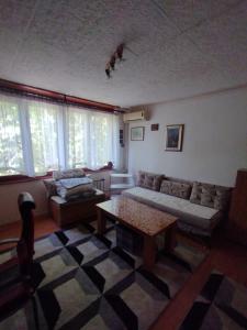 Χώρος καθιστικού στο Apartment H Sarajevo