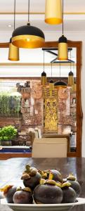 a plate of food on a table with lights at Winy Estate - Luxury Villa with Rooftop Jacuzzi in Canggu +44 photos