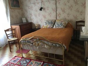 Postel nebo postele na pokoji v ubytování Chez Christian