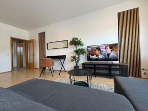 TV a/nebo společenská místnost v ubytování Bavaria Home - Zentral, Küche, Netflix