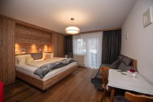 Postel nebo postele na pokoji v ubytování Haus Scharler, Talstation