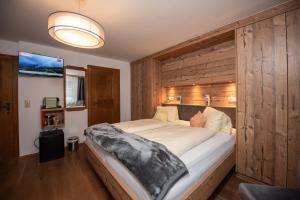 Postel nebo postele na pokoji v ubytování Haus Scharler, Talstation