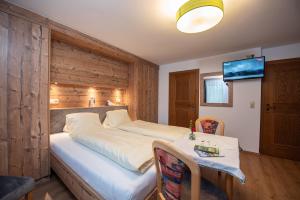 Postel nebo postele na pokoji v ubytování Haus Scharler, Talstation