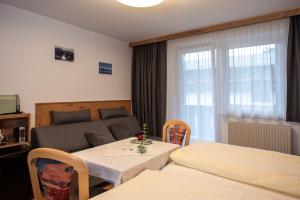 Postel nebo postele na pokoji v ubytování Haus Scharler, Talstation