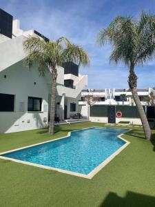 Swimmingpoolen hos eller tæt på Penthouse Atico Cálida