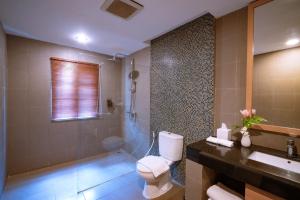Kopalnica v nastanitvi Manado Tateli Resort and Convention