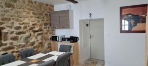 Η κουζίνα ή μικρή κουζίνα στο Charmante maison de village +11 φωτογραφίες