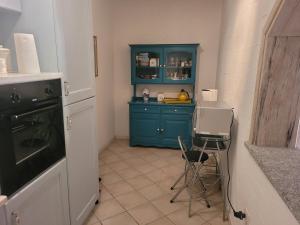 Kuchyň nebo kuchyňský kout v ubytování VILLA TRAMONTI SUL MARE