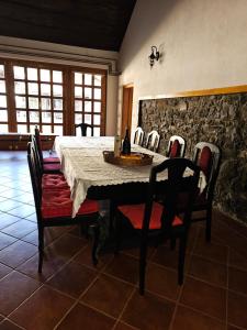 a dining room with a table and chairs at Country Villa Velebit, Sveti Rok, Lika in Sveti Rok