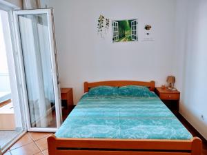 Postel nebo postele na pokoji v ubytování Apartment Studio A2_Medulin