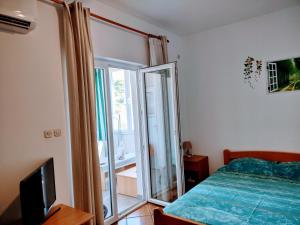 Postel nebo postele na pokoji v ubytování Apartment Studio A2_Medulin
