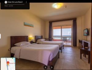 Ένα ή περισσότερα κρεβάτια σε δωμάτιο στο 2 غرفة فندقية بقرية فنار دي لونا