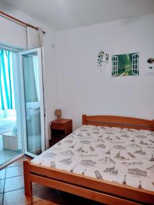 Postel nebo postele na pokoji v ubytování Apartment Studio A2_Medulin
