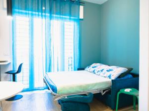 Ένα ή περισσότερα κρεβάτια σε δωμάτιο στο BellBell Charme Maison